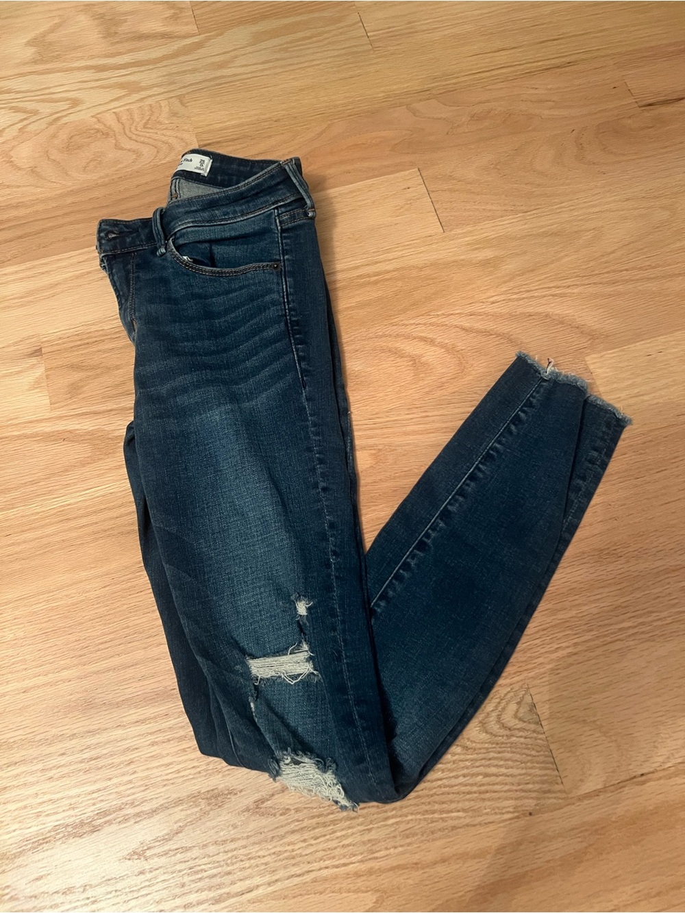Abercrombie & Fitch Dark Blue Distressed Womenβs Skinny Jeans